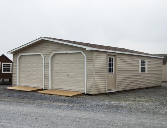 24' x 32' two-car modular garage with vinyl siding and upgraded flooring