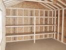 12x24 Peak Garage Interior with Built In Shelving